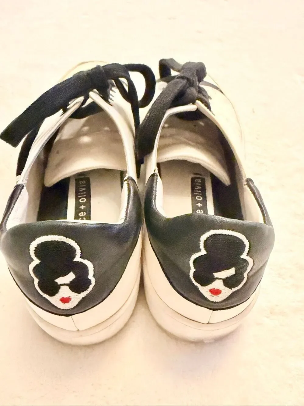 Alice + Olivia step up